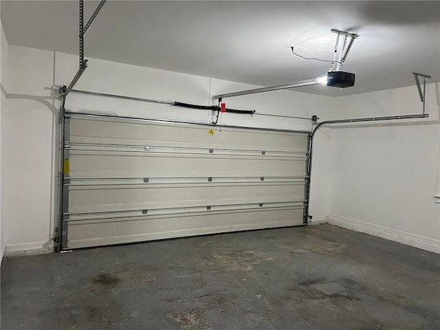 garage featuring a garage door opener