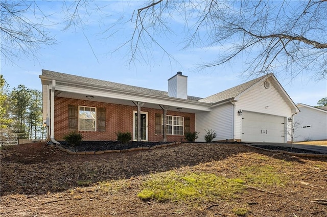 ranch-style house featuring a garage, brick siding, a chimney, and a porch