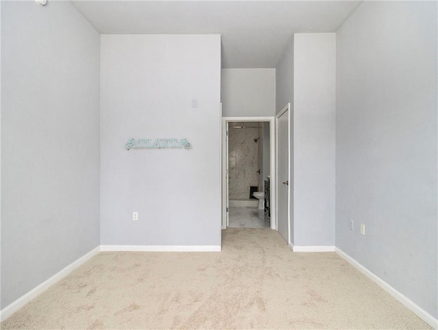 empty room featuring carpet flooring