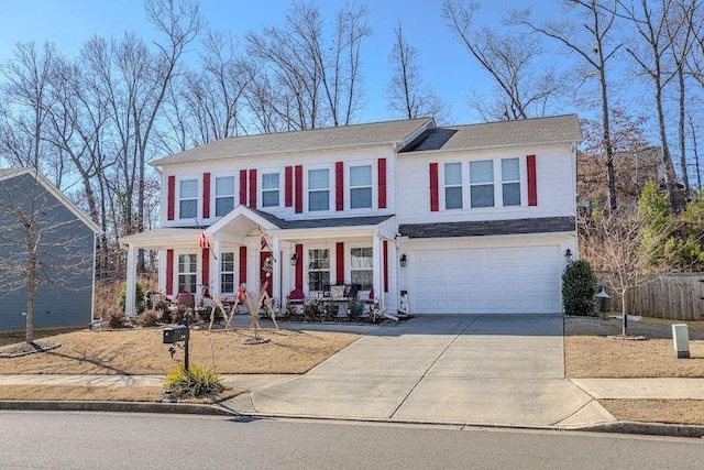 view of front facade with a porch and a garage