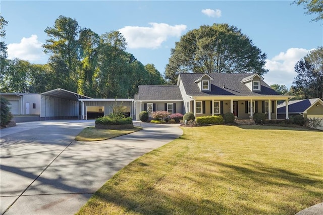 new england style home with a front lawn and covered porch