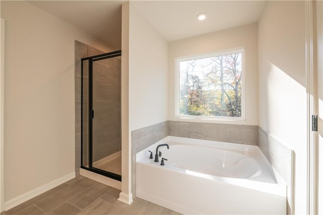 bathroom with independent shower and bath