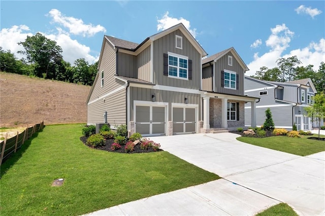 view of front of house with central AC unit, a garage, and a front yard