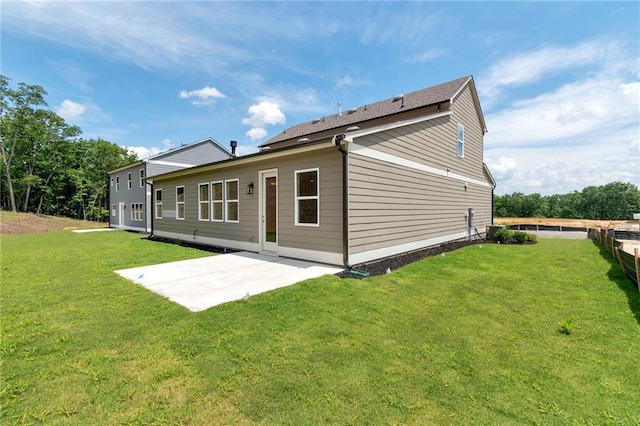 329 Willow Cv, Canton, GA 30114 - back of house with a patio and a lawn