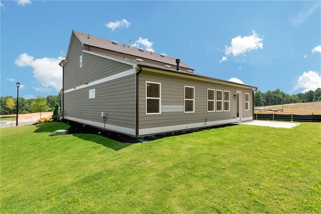 329 Willow Cv, Canton, GA 30114 - rear view of property with fence and a lawn