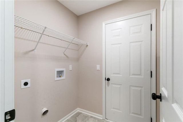 laundry room with laundry area, hookup for a washing machine, electric dryer hookup, and baseboards