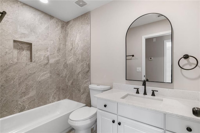 full bathroom with vanity, toilet, bathtub / shower combination, and visible vents