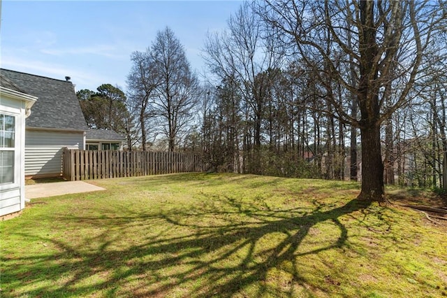 view of yard with fence