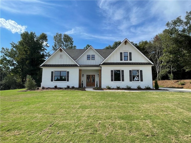 modern farmhouse with a front lawn