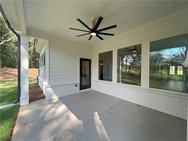 view of patio with ceiling fan