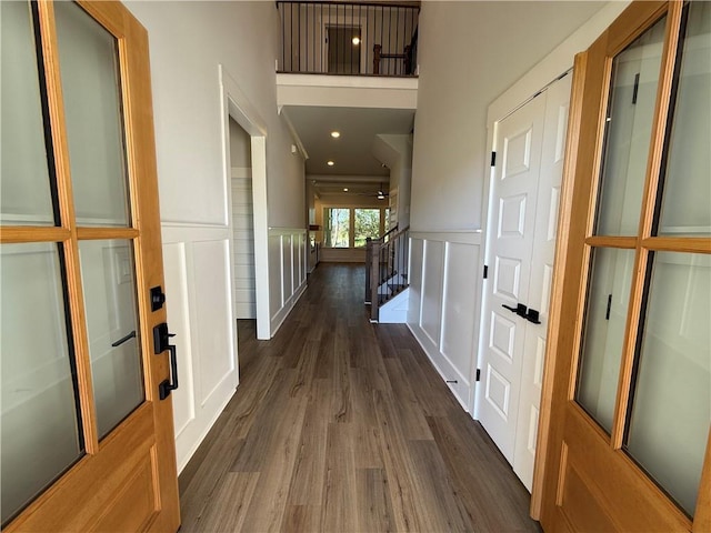 hallway featuring dark hardwood / wood-style floors