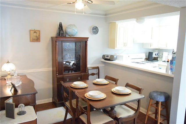 574 Trillum Ct SW, Marietta, GA 30008 - dining area featuring a ceiling fan and ornamental molding