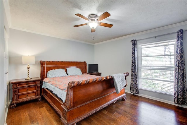 bedroom featuring dark wood-type flooring, crown molding, and multiple windows