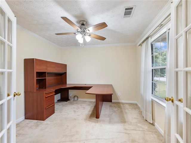 office with ceiling fan, crown molding, light carpet, and a healthy amount of sunlight