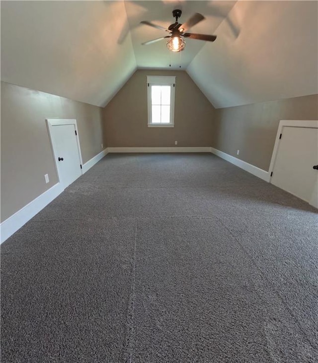 bonus room featuring ceiling fan, lofted ceiling, and carpet