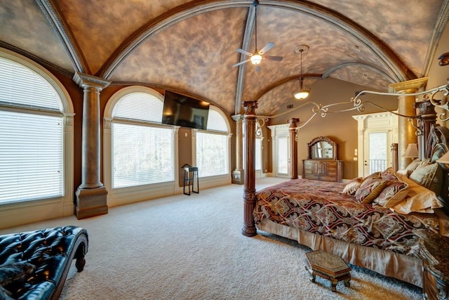 carpeted bedroom featuring brick ceiling, ornate columns, ceiling fan, and vaulted ceiling