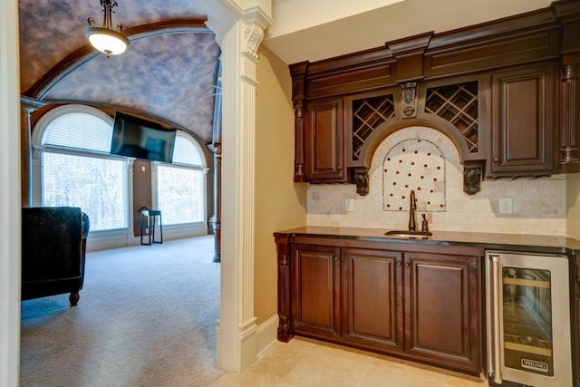 bar with backsplash, sink, wine cooler, and light carpet