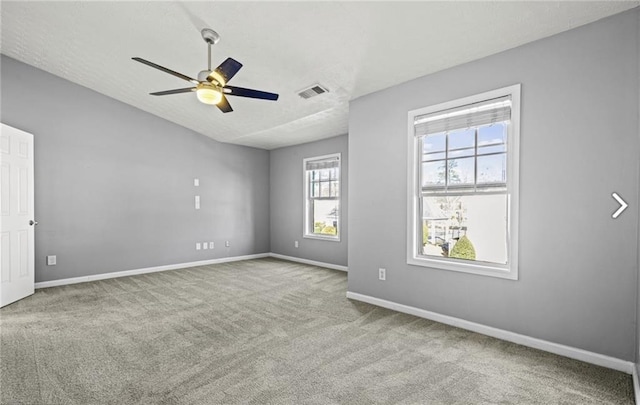 1332 Adcox Sq, Stone Mountain, GA 30088 - carpeted empty room with ceiling fan, baseboards, and a textured ceiling