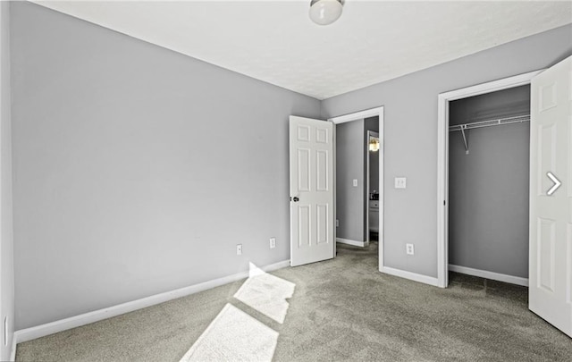 1332 Adcox Sq, Stone Mountain, GA 30088 - unfurnished bedroom featuring carpet floors, baseboards, and a closet