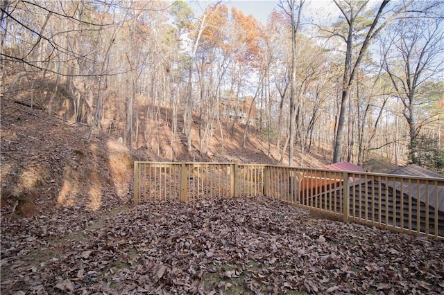 view of yard featuring a wooden deck