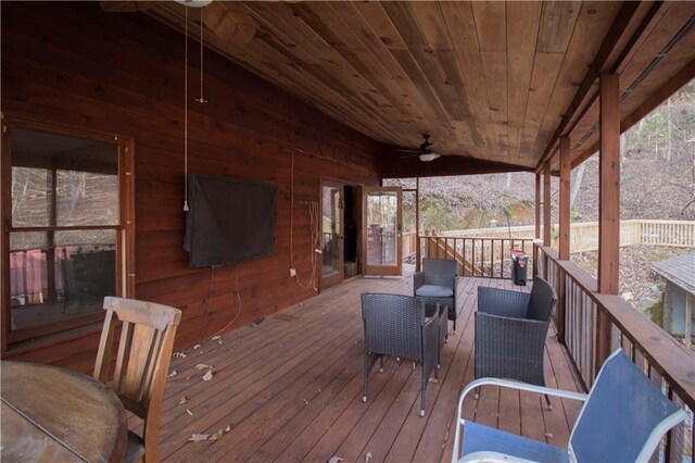 wooden deck with ceiling fan