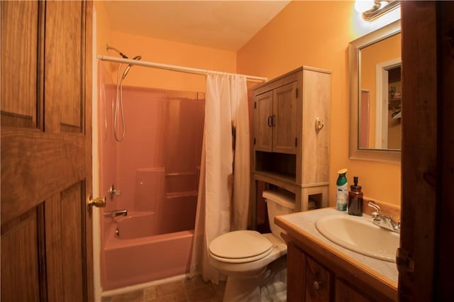 full bathroom with shower / bath combination with curtain, toilet, and vanity