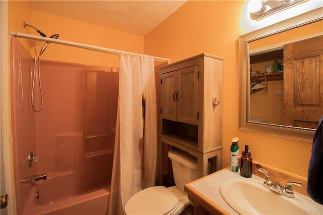 full bathroom featuring vanity, shower / bath combination with curtain, and toilet