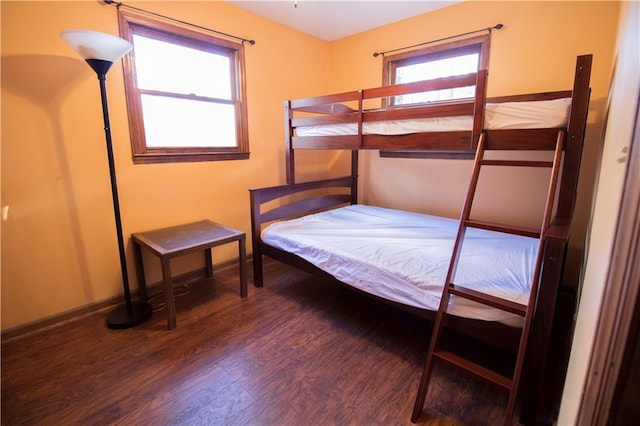 bedroom featuring dark hardwood / wood-style floors