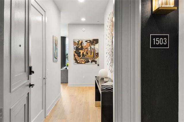 corridor featuring light hardwood / wood-style flooring