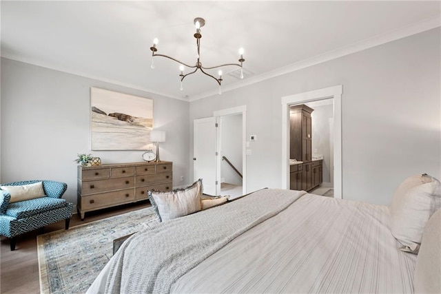 4200 Legacy Ln Unit 22, Acworth, GA 30101 - bedroom featuring a chandelier, ornamental molding, wood finished floors, and ensuite bathroom