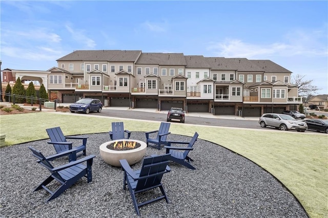 4200 Legacy Ln Unit 22, Acworth, GA 30101 - view of home's community with an outdoor fire pit, a residential view, and a lawn