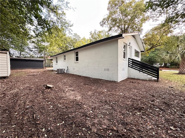 view of home's exterior featuring central air condition unit