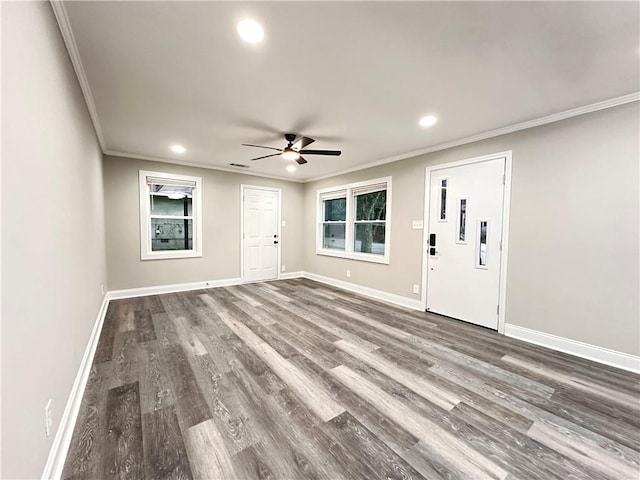 interior space featuring a healthy amount of sunlight, crown molding, hardwood / wood-style floors, and ceiling fan