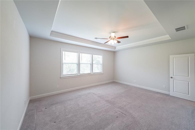 5789 Creek Indian Dr, Sugar Hill, GA 30518 - carpeted empty room with a raised ceiling, a ceiling fan, and baseboards
