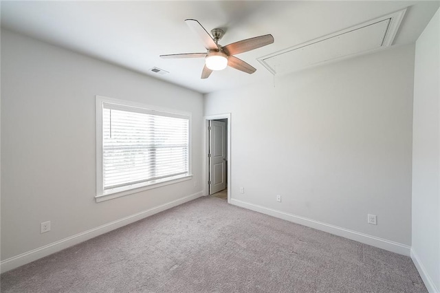 5789 Creek Indian Dr, Sugar Hill, GA 30518 - unfurnished room featuring attic access, a ceiling fan, light colored carpet, and baseboards