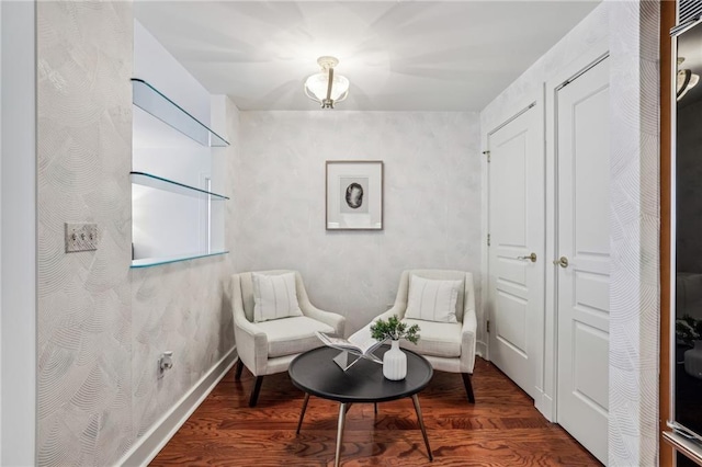 sitting room featuring hardwood / wood-style floors