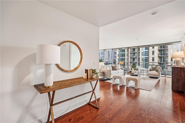 living room featuring hardwood / wood-style floors and expansive windows