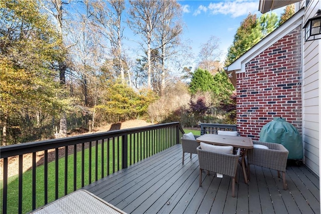 wooden deck with a yard