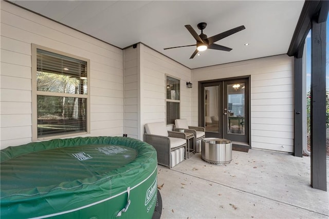 view of patio with ceiling fan