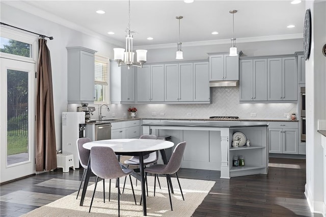 3380 Labrouste Cv, Duluth, GA 30097 - kitchen with gray cabinets, backsplash, a sink, a chandelier, and under cabinet range hood