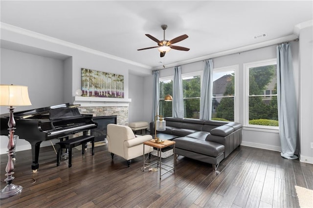 3380 Labrouste Cv, Duluth, GA 30097 - sitting room with a stone fireplace, a ceiling fan, baseboards, wood finished floors, and visible vents