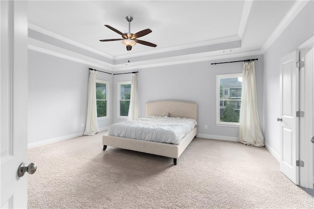 3380 Labrouste Cv, Duluth, GA 30097 - bedroom featuring carpet floors, a tray ceiling, crown molding, and baseboards