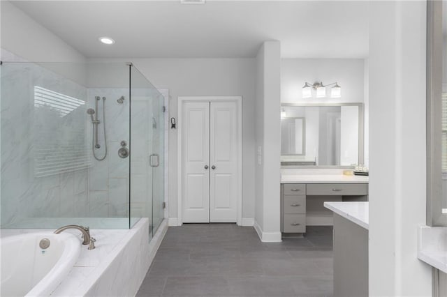 3380 Labrouste Cv, Duluth, GA 30097 - full bathroom featuring a garden tub, tile patterned flooring, a stall shower, vanity, and recessed lighting