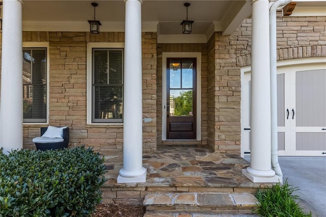 3380 Labrouste Cv, Duluth, GA 30097 - doorway to property featuring covered porch and stone siding