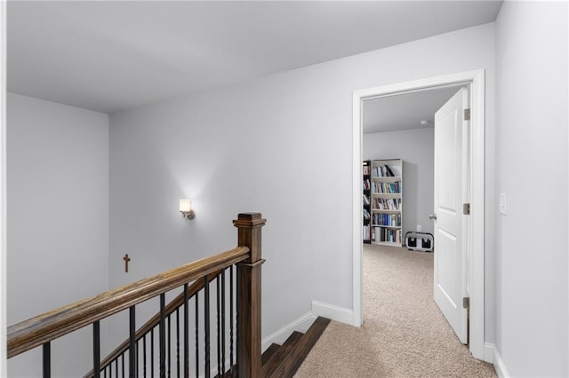 3380 Labrouste Cv, Duluth, GA 30097 - hallway featuring baseboards, carpet flooring, and an upstairs landing