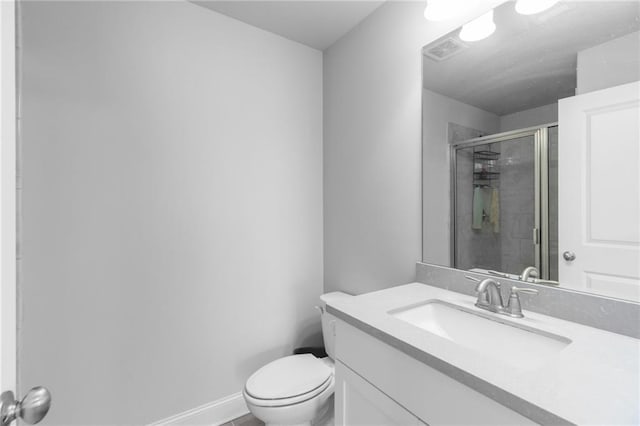 3380 Labrouste Cv, Duluth, GA 30097 - full bath with vanity, toilet, baseboards, visible vents, and a stall shower