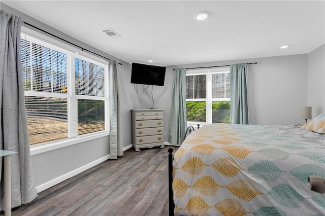 bedroom featuring hardwood / wood-style floors