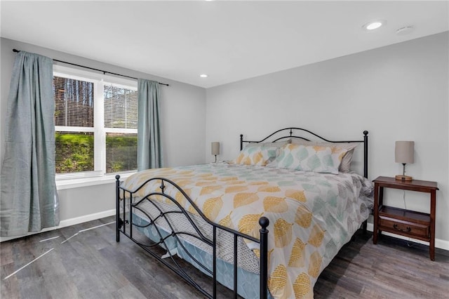 bedroom featuring dark hardwood / wood-style floors