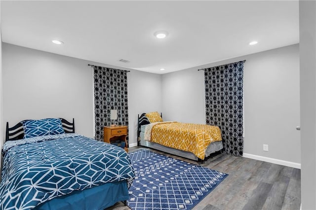 bedroom featuring wood-type flooring