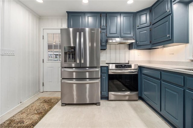 kitchen featuring blue cabinets, under cabinet range hood, appliances with stainless steel finishes, and light countertops